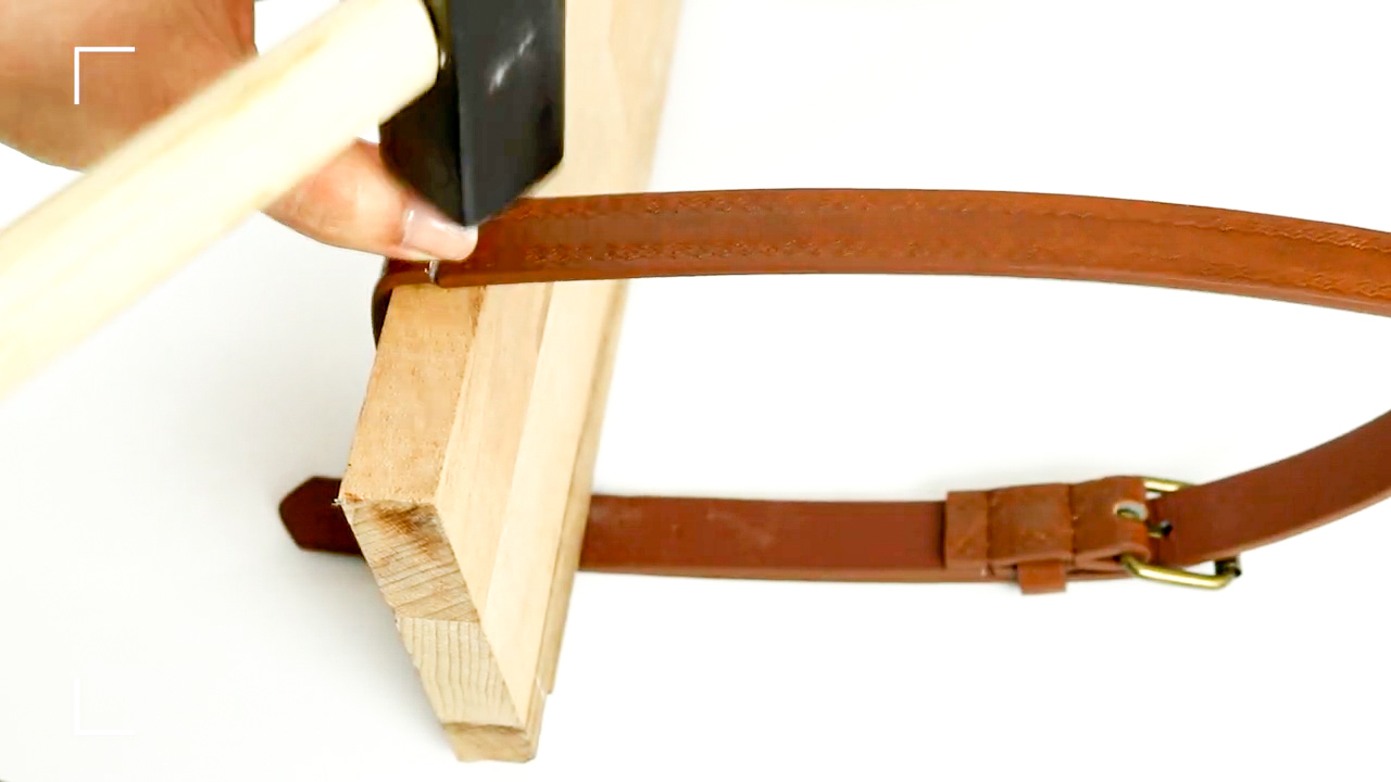 Shelves hung with old belts